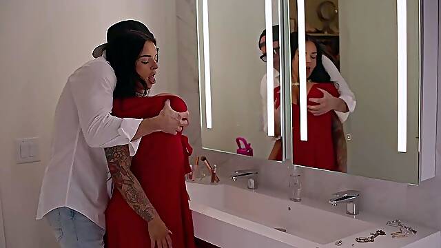 Busty babe playing with her big boobs