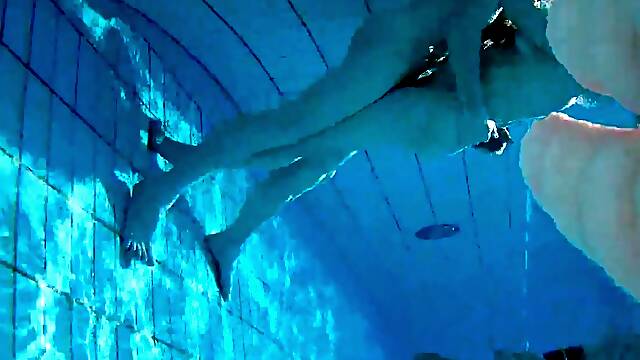 Voyeur films amateur couple having sex in public pool