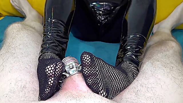 My soles in fishnet socks tease his virginity belt
